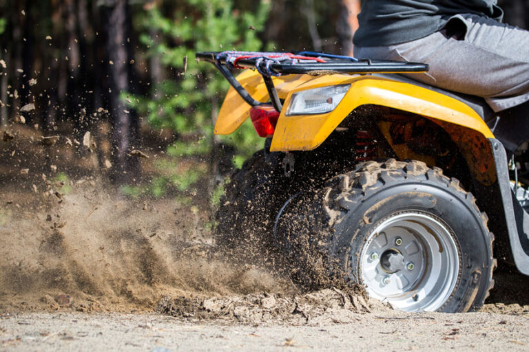 An ATV quadbike sandy road